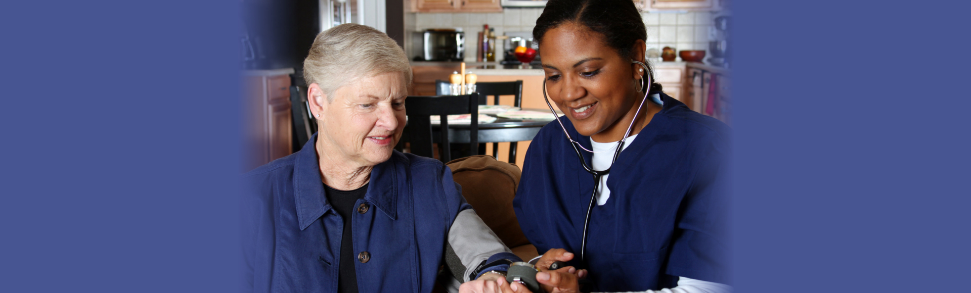 caregiver and elderly woman talking